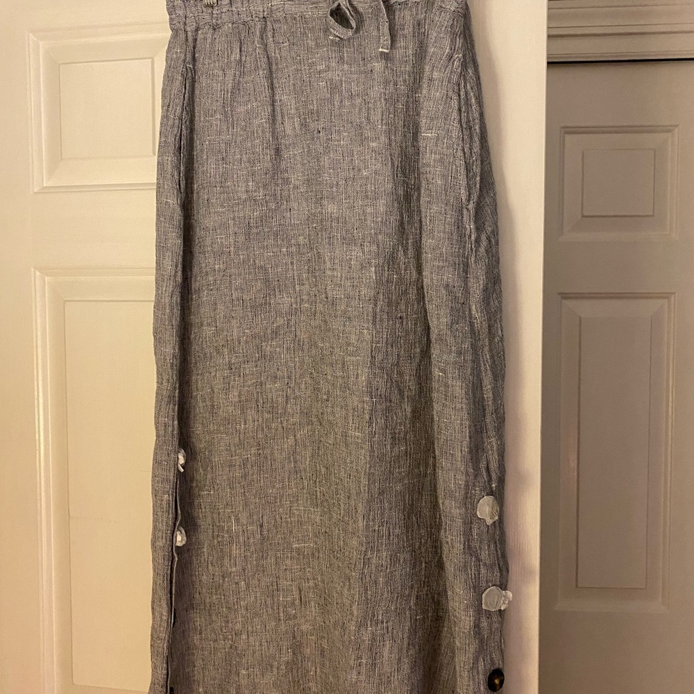Tahari linen skirt with decorative buttons on the sides.  New and never worn.